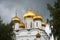 Domes of the Cathedral of the Holy Trinity Ipatiev Monastery closeup gloomy September day. Kostroma