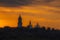 Domes of Lavra Cathedral in Kiev, low angle. Yellow sunset background. Outlines view.