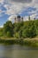 Domes of the monastery are reflected in the lake of Theophany Park. Kiev