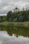 Domes of the monastery are reflected in the lake of Theophany Park. Kiev