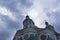 Domes of the Orthodox Cathedral in the background of clouds.