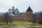 The domes of St. Sophia Cathedral and the Vladimir Tower, April day. Kremlin of Veliky Novgorod, Russia