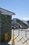 Domestic arrivals sign by Air New Zealand plane, Queenstown airport with mountains in background