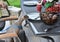 Domestic cat waiting for food sitting like man at table