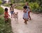 Domestic Dog and kids in rural region