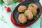 Domestic meat cutlet with white beans and fresh herbs. Cast-iron frying pan full of delicious fried meat cutlets, fresh greens and