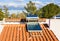 Domestic solar panel on a roof, with clear, cloudless sky