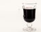 Domestic wine. Glass of red hot wine on white background