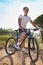 Dominating the trails. A young man riding his mountain bike on a forest trail.