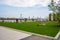 Domino park in the late afternoon with people exercising. Domino Park is a 6-acre public park in the Williamsburg neighborhood of