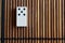 Domino piece on the bamboo brown wooden table background. Domino set empty - 5 dots.