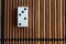 Domino piece on the bamboo brown wooden table background. Domino set - two - 3 dots.