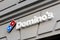 Domino`s Pizza logo on Domino`s Pizza restaurant