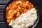 Domoda is the national dish of Gambia, a peanut stew made with meat pumpkin and served over fluffy rice close-up in a plate.