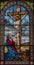 DOMODOSSOLA, ITALY - JULY 19, 2022: The Crucifixion and mother Mary on the stained glass