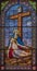 DOMODOSSOLA, ITALY - JULY 19, 2022: The Pieta on the stained glass in church Chiesa dei Santi Gervasio e Protasio