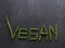 Don`t eat animals The word `vegan` written with green beans