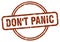 don\'t panic stamp. don\'t panic round vintage grunge label.