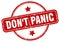 don\'t panic stamp. don\'t panic round vintage grunge label.