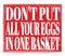 DON`T PUT ALL YOUR EGGS IN ONE BASKET, text on red stamp sign