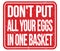 DON`T PUT ALL YOUR EGGS IN ONE BASKET, words on red stamp sign