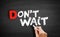 Don`t Wait text on blackboard