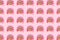 Donat pattern on pink background. Abstract funny face of woman from donut with eyes and hair from centimeter tape. Diet or