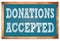 DONATIONS ACCEPTED words on blue wooden frame school blackboard