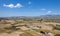 Done aerial image of agriculture field farmland. Harvesting outdoor