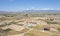 Done aerial image of agriculture field farmland. Harvesting outdoor