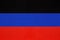 Donetsk People`s Republic national fabric flag from textile. Symbol of unrecognized state of Ukraine