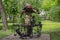 Donetsk, Ukraine - May 09, 2017: Iron statue of a beetle near an anvil in a park