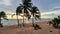 Dongtan Beach Pattaya Jomtien Thailand, palm trees on the beach during sunset