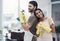 Dont just bust germs, bust gender stereotypes. a happy young couple getting ready to disinfectant their home.