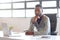 Dont settle for anything less than successful. Portrait of a young businessman sitting at his desk in an office.