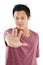 Dont take another step. Studio portrait of a young man holding out his hand against a white background.