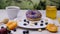 Donut with berries, strawberries. Close-up video shooting, dark background