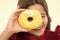 Donut breaking diet concept. Girl hold glazed donut white background. Kid girl hungry for sweet donut. Sugar levels and
