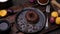 Donut with chocolate and coffee. Close-up 4k video shooting, dark background