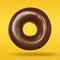 Donut chocolate in flying on pastel orange and yellow background. Doughnut closeup front view