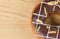 Donut chocolate glazing on wooden background, Assorted Colorful.