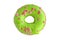 Donut covered with green glaze and sprinkled with pink hearts