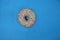Donut decorated with topping  on blue background flat lay
