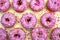 donut donuts sprinkles on doughnuts flat lay pink bright sugar strands background