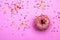 Donut donuts sprinkles on doughnuts pink bright sugar strands background