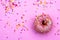 Donut donuts sprinkles on doughnuts pink bright sugar strands background