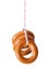 Donut hanging on a measuring tape
