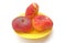 Donut peaches on a yellow saucer