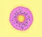 donut with pink glaze, sweet doughnut on yellow