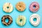 Donuts assorted with glazed on blue and pink